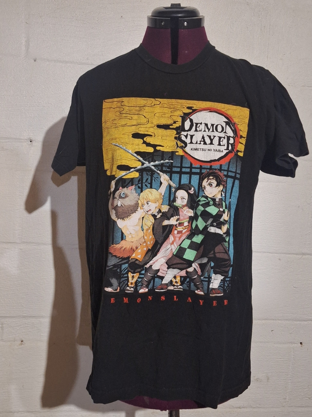 Demon Slayer Black Graphic Tee with Yellow & Red Detail